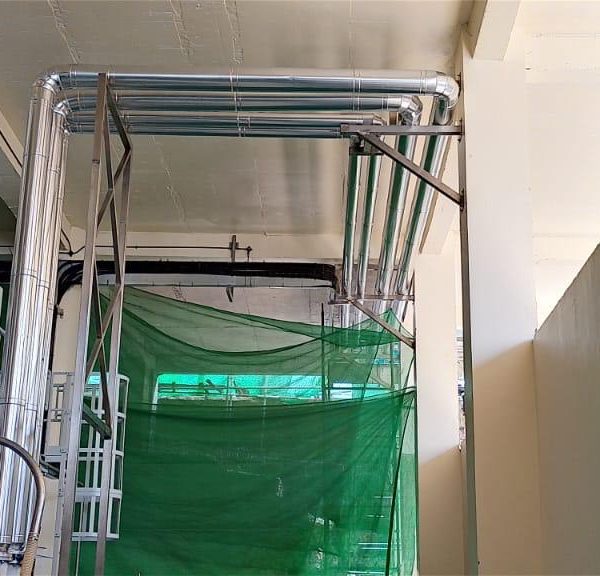 Installation and cladding of stainless steel piping for pre-formed plant.