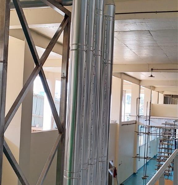 Installation and cladding of stainless steel piping for pre-formed plant.