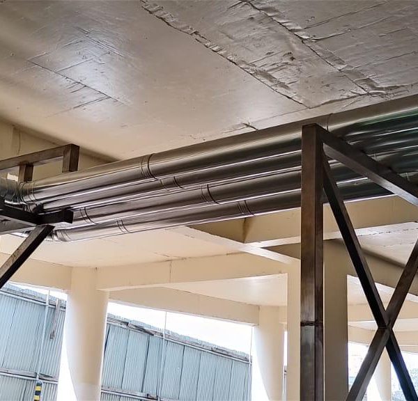 Installation and cladding of stainless steel piping for pre-formed plant.