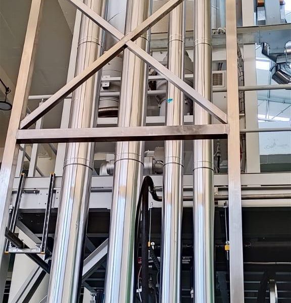 Installation and cladding of stainless steel piping for pre-formed plant.