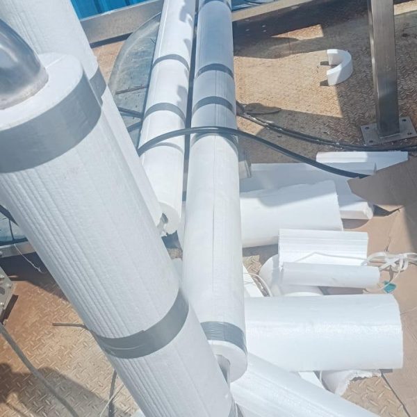Installation and cladding of stainless steel piping for pre-formed plant.