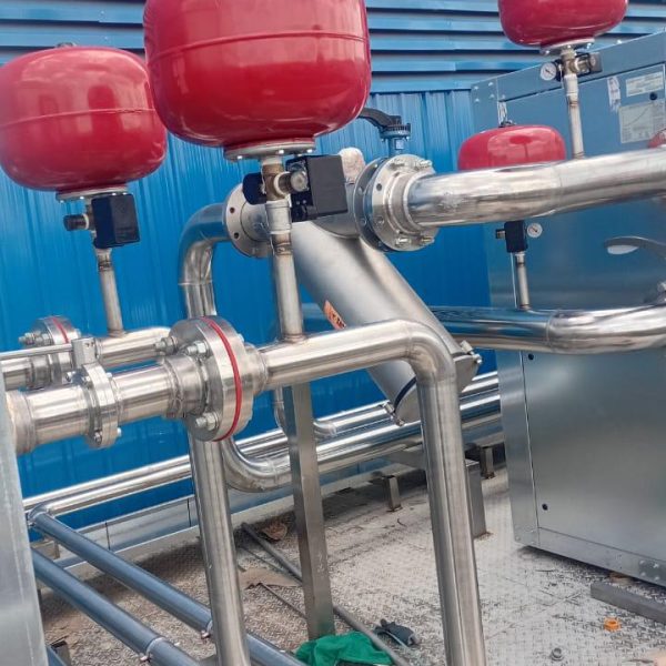 Installation and cladding of stainless steel piping for pre-formed plant.