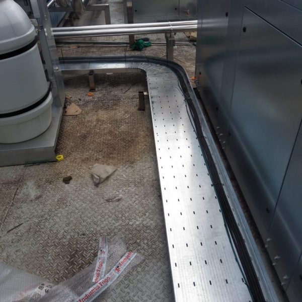 Installation and cladding of stainless steel piping for pre-formed plant.