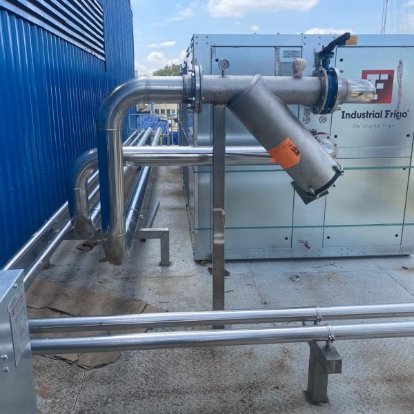 Installation and cladding of stainless steel piping for pre-formed plant.